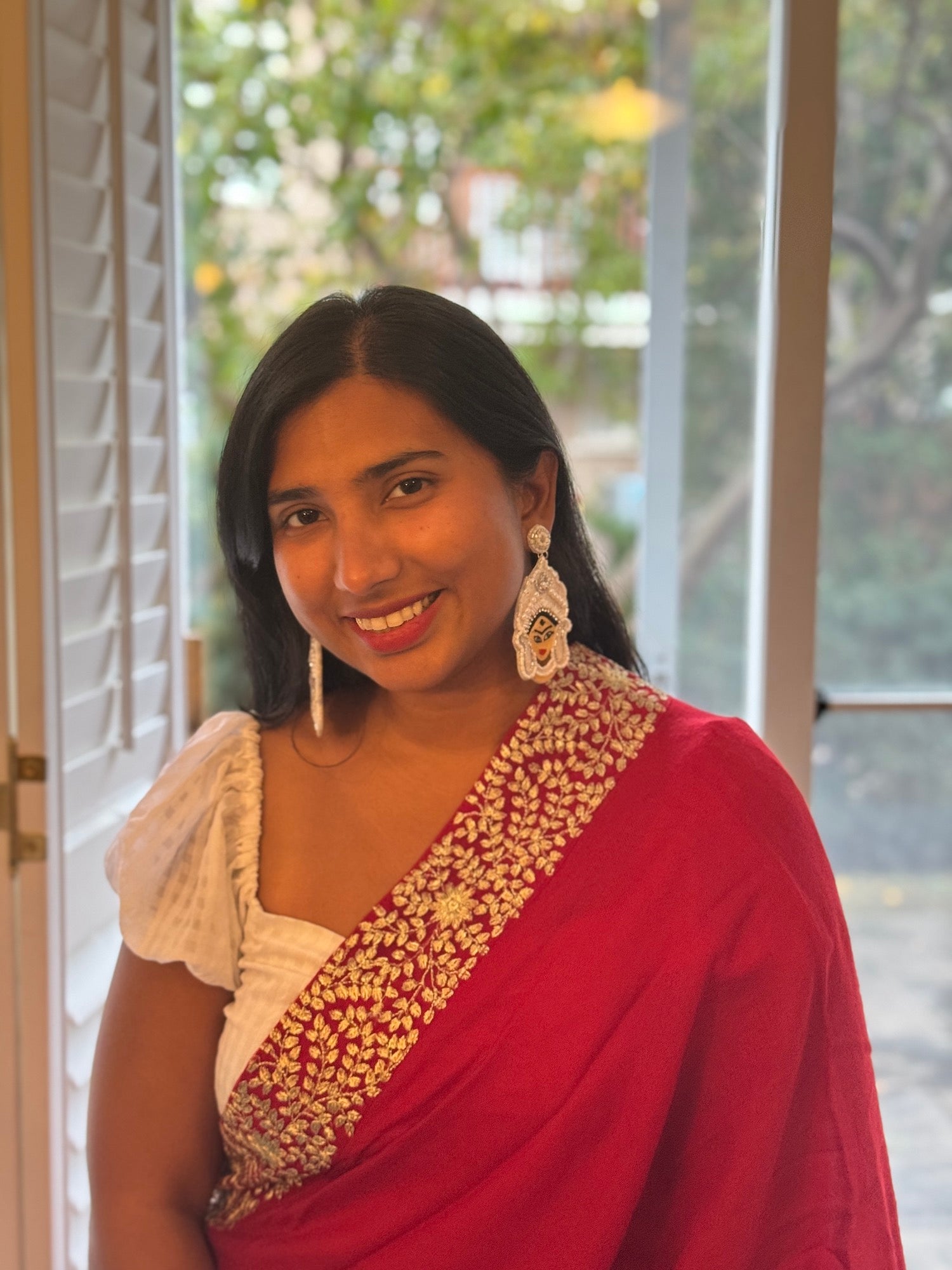 Choosing to wear RED SAREE WITH CAPE completed by the stunning earrings as  well as striking hair glossing their way to your face, is all… | Instagram